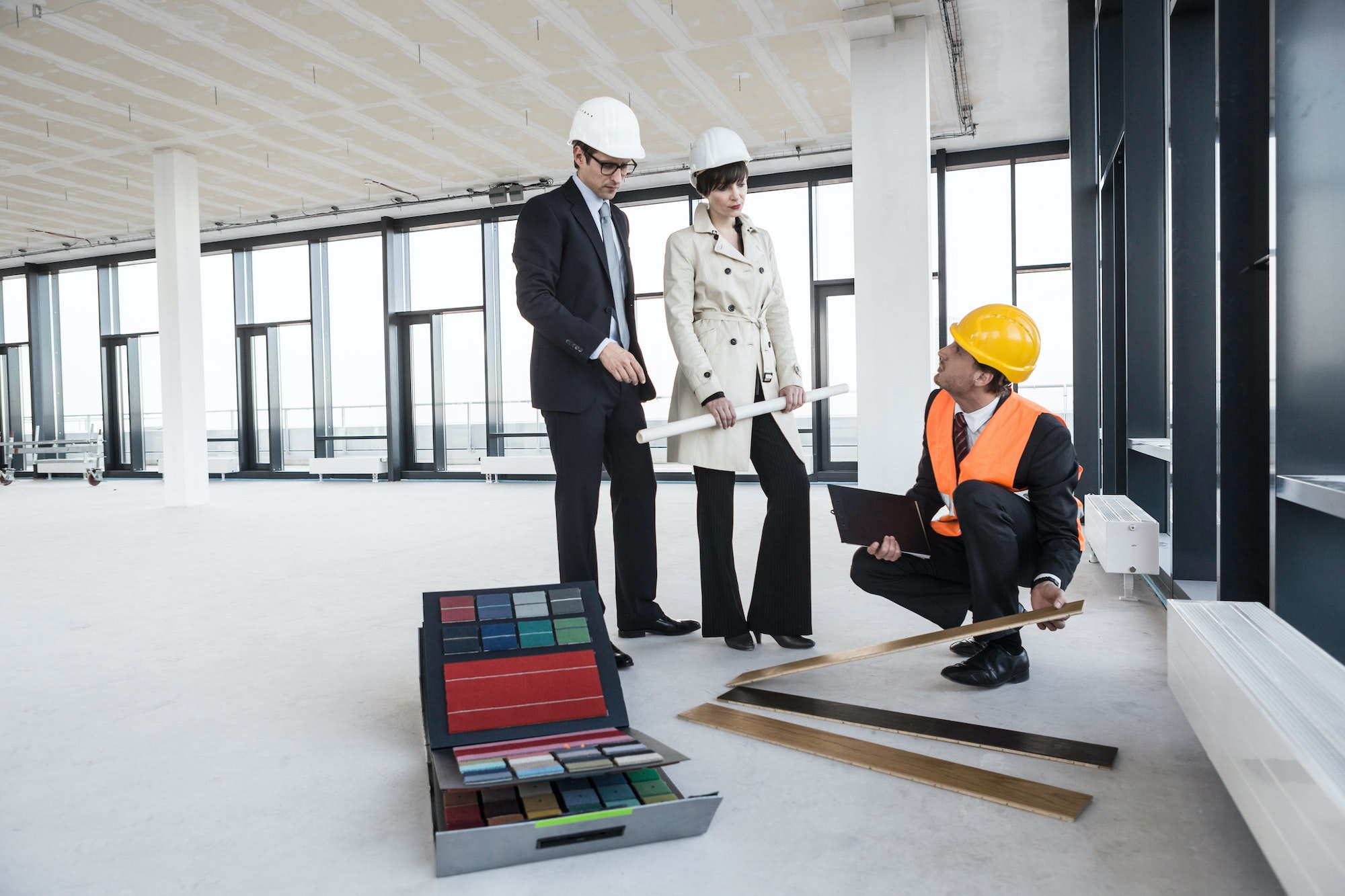 Architects discussing flooring samples